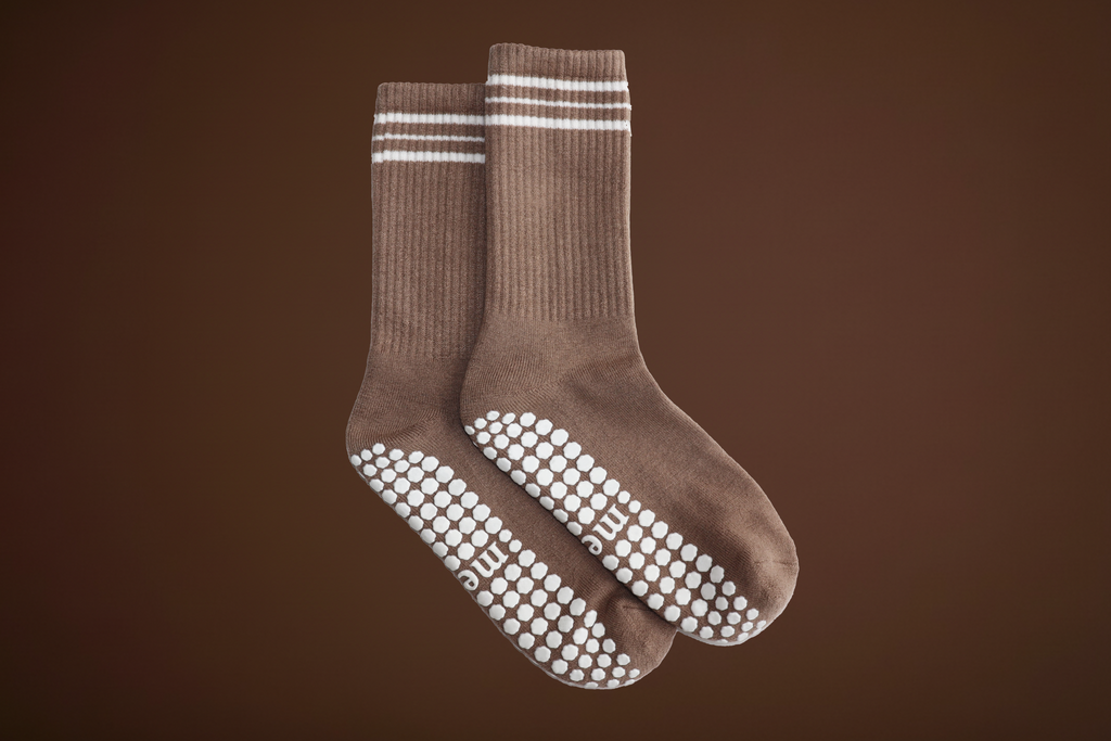 brown merino wool pilates grip sock with horizontal stripes detail and white grip pattern